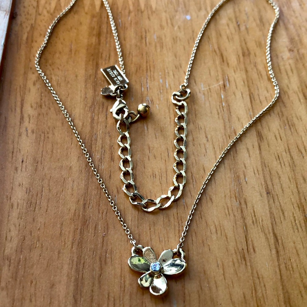 kate spade DAINTY GOLD-TONE FLOWER WITH CRYSTAL CENTER (SIMILAR TO PANSY).NWOT🌸
